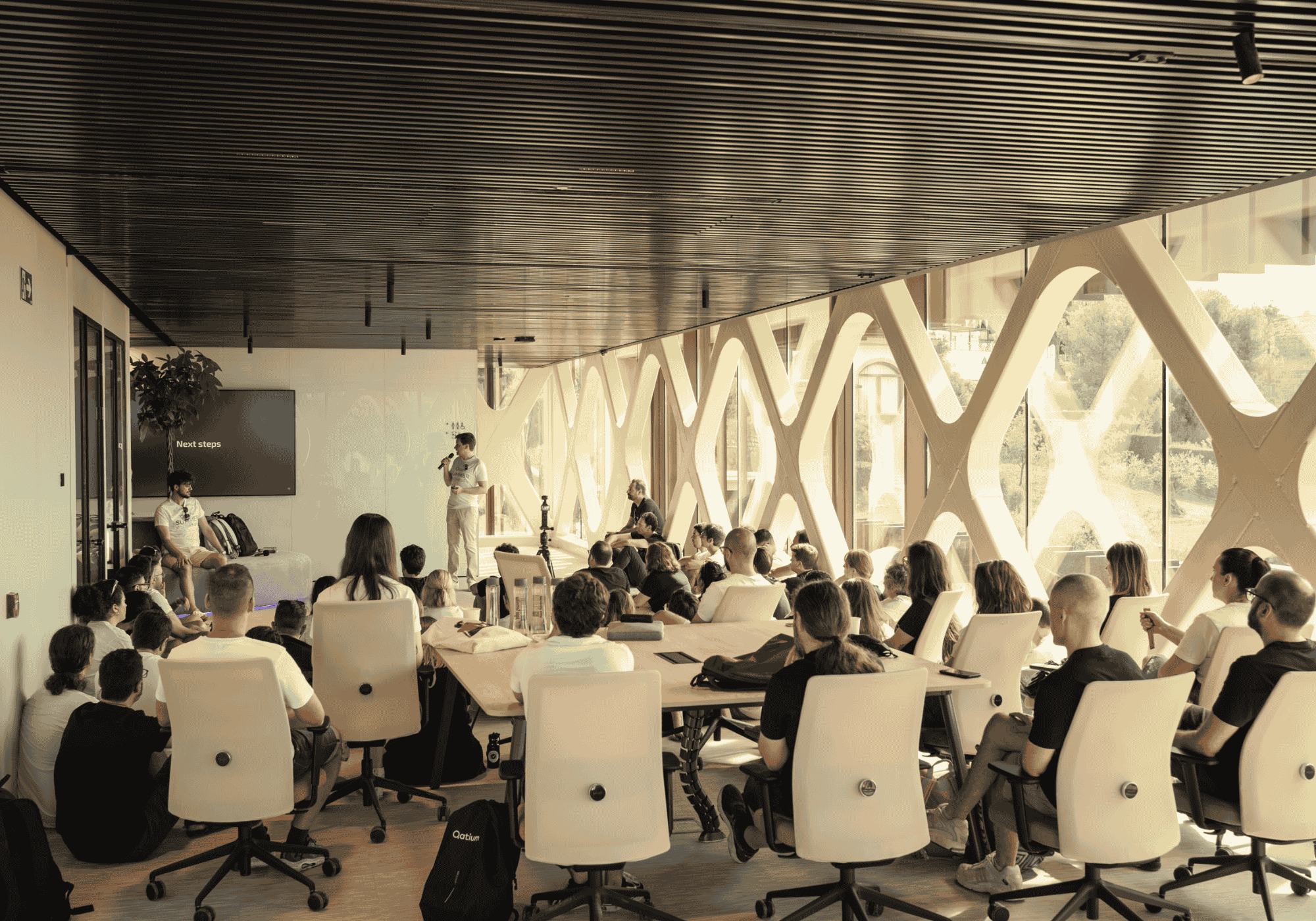People attending a talk in a meeting room at Bellver Blue Tech Zone